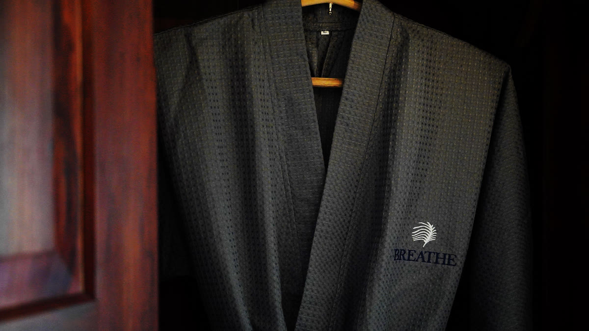 Breathe embroidered bathrobe — wellness amenities at the boutique hotel