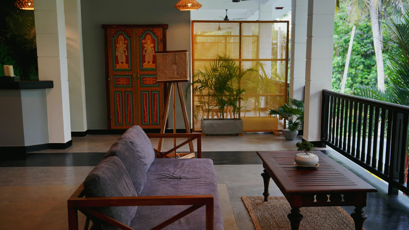 Lounge corner with painted door and jungle views, Sri Lanka