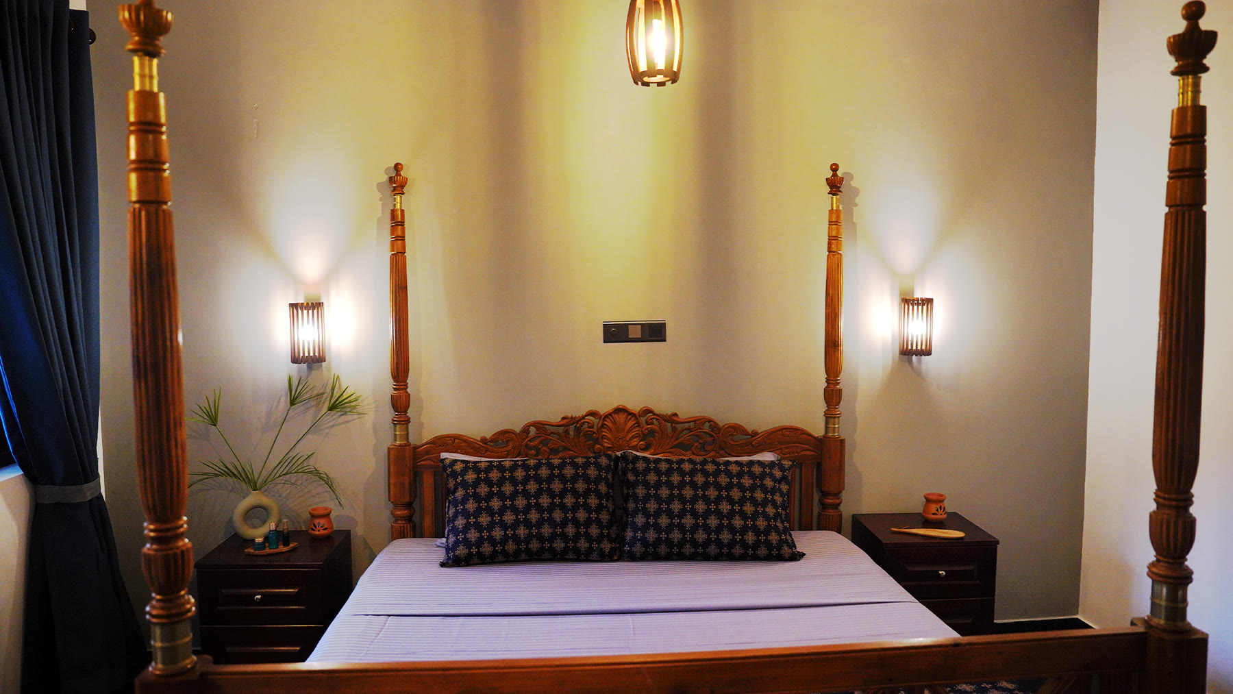 Four-poster bedroom at Breathe Collections